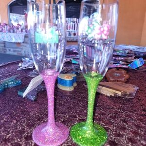 2 beautiful wine glasses wicked theme.